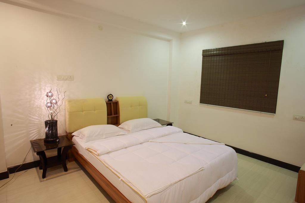Phils' Residency & Banquets Hotel Kochi Værelse billede