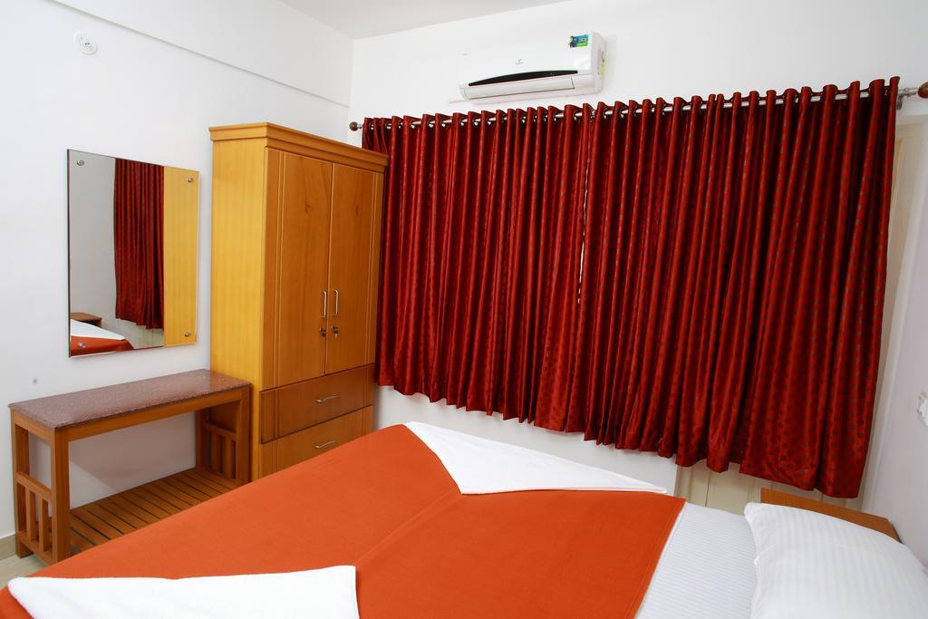 Phils' Residency & Banquets Hotel Kochi Værelse billede